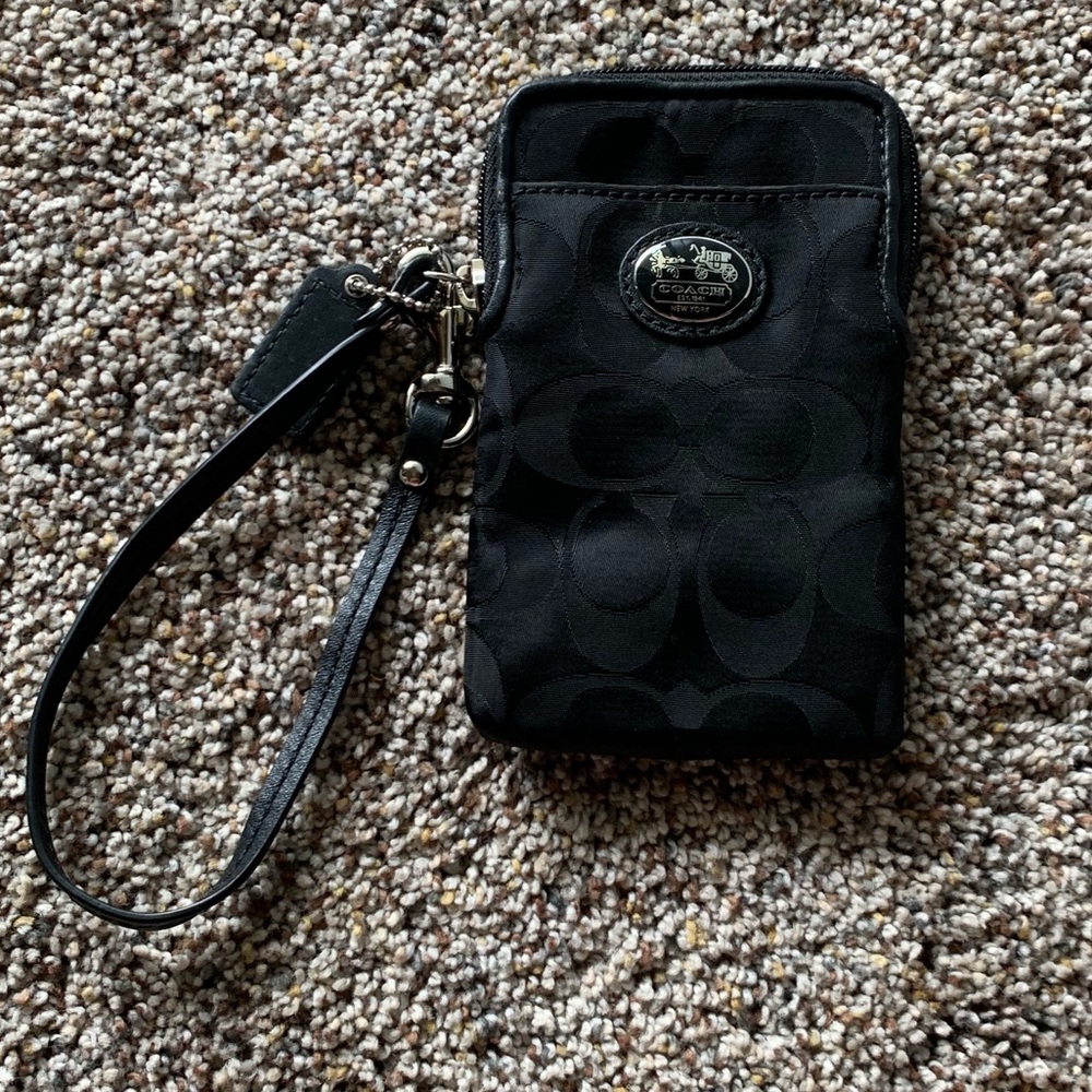 Coach wristlet. Small black vertical wristlet